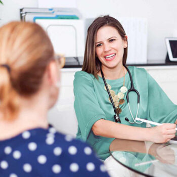 A Santé Cannabis doctor speaking to a patient